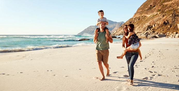 family on beach 767x418
