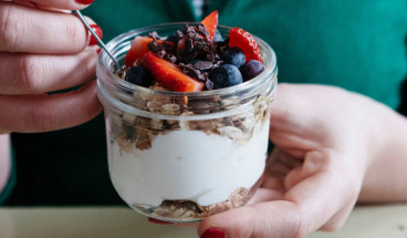 woman eating yoghurt